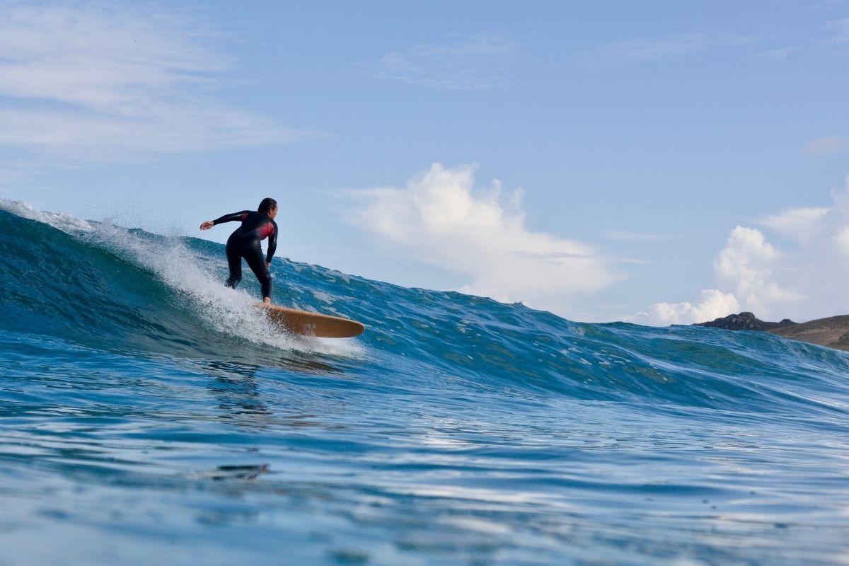 surfing in one of my favourite wetsuit brands for women