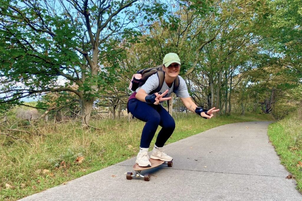 woman longboarding skateboarding in zeeland holland