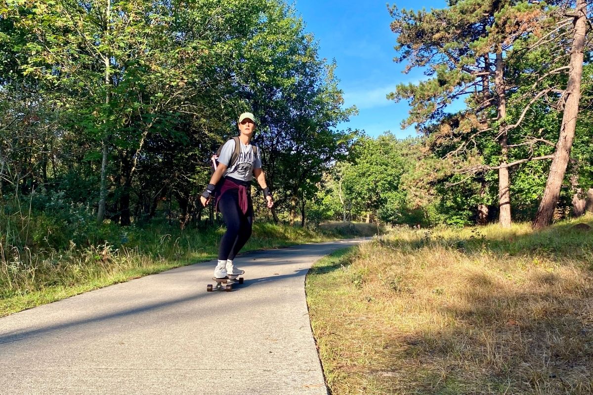 woman longboarding in zeeland